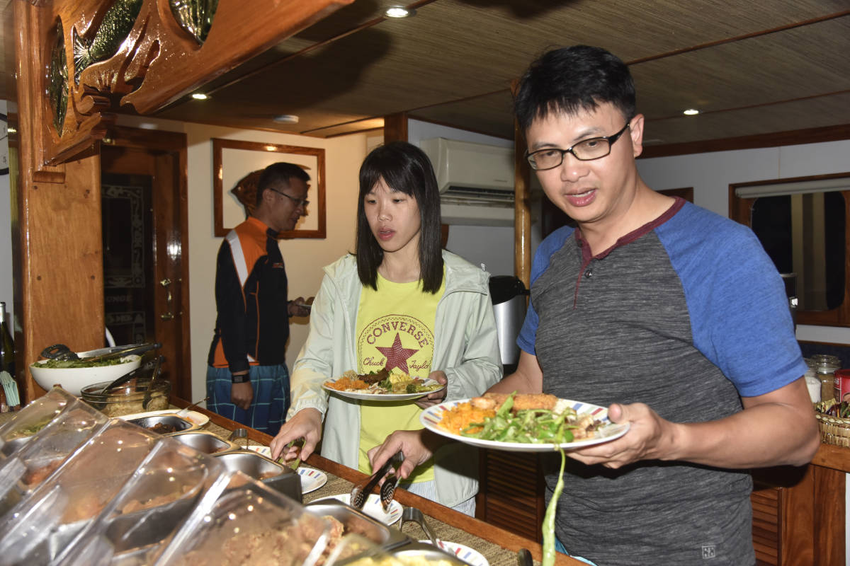 Taiwanese Travel Agents enjoying an evening aboard Palau's best liveaboard, the Ocean Hunter Palau